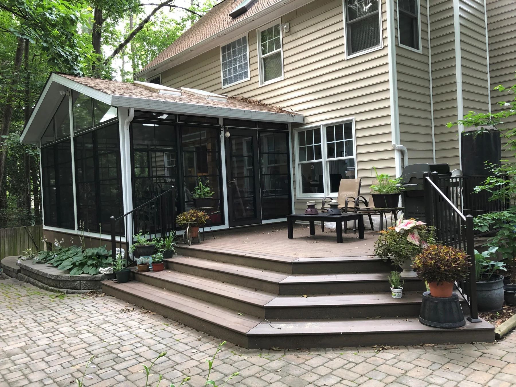 Completed deck and porch project by Old Dominion Innovations